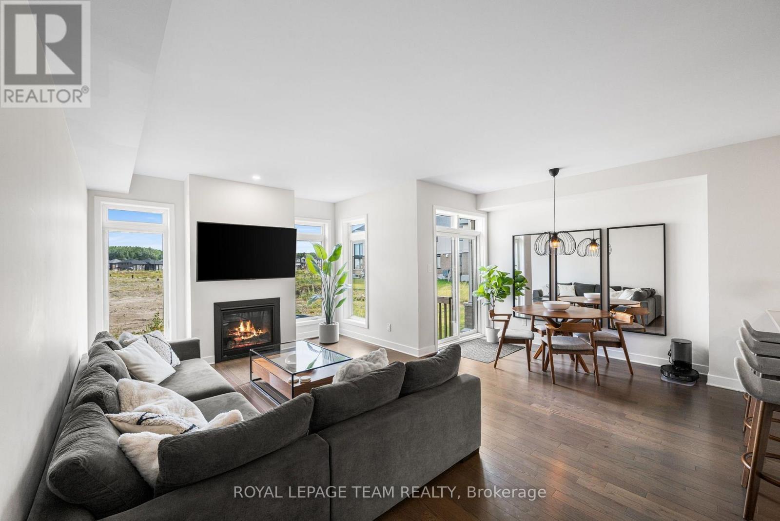 Living room & Dining Area - 800 Solarium Avenue, Ottawa, ON - Indoor Photo Showing Living Room With Fireplace
