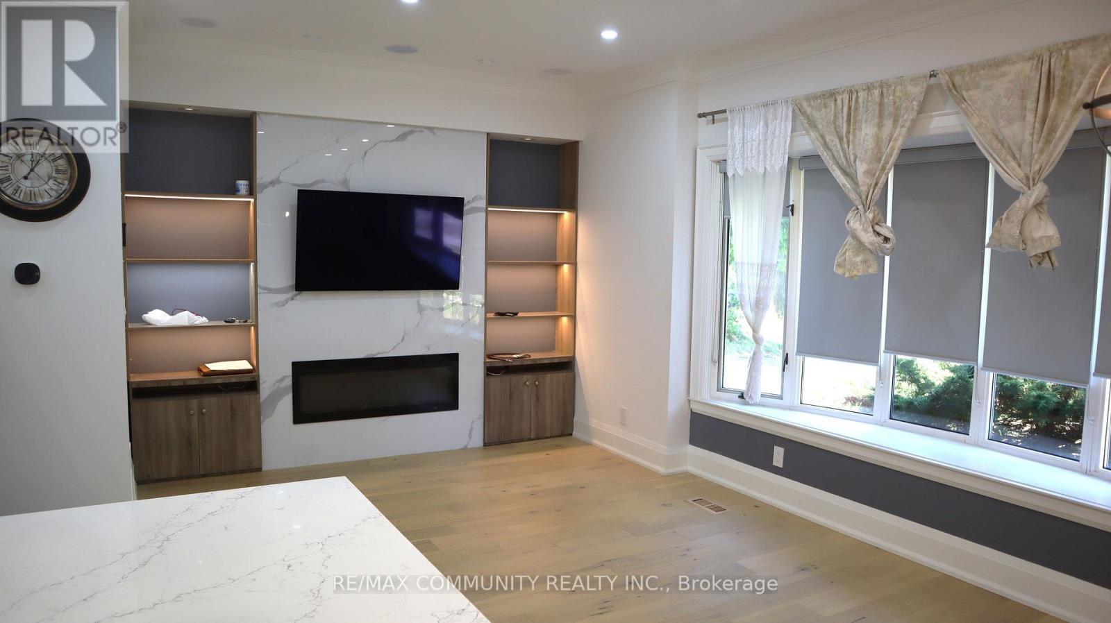 7 Denham Road, Toronto, ON - Indoor With Fireplace