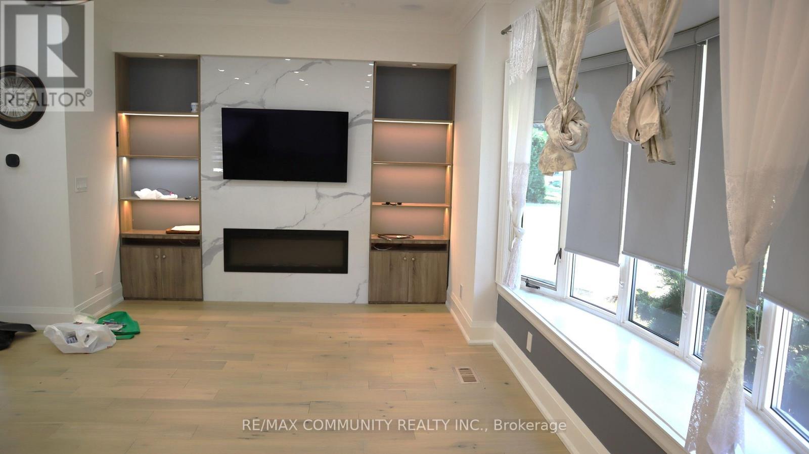 7 Denham Road, Toronto, ON - Indoor With Fireplace
