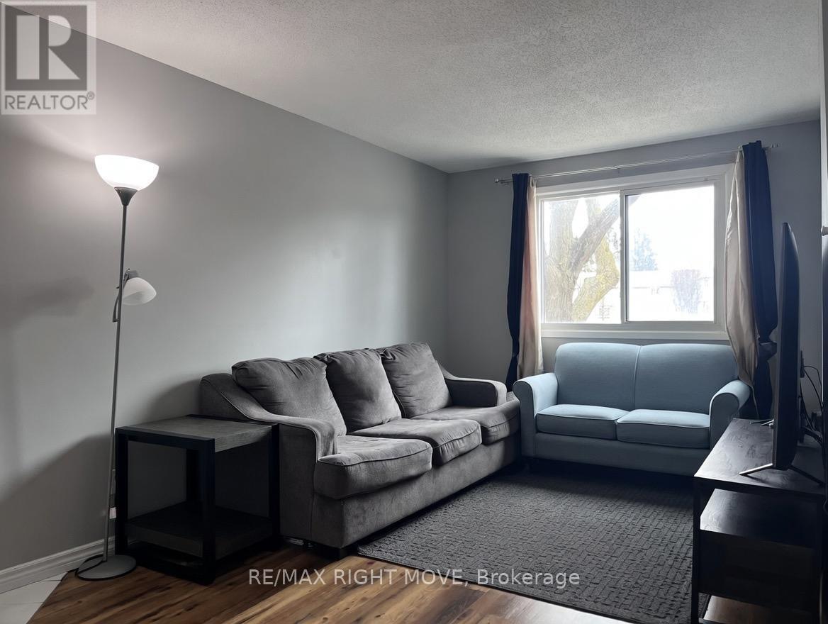 AI Enhanced - 3 - 486 Springbank Avenue N, Woodstock, ON - Indoor Photo Showing Living Room