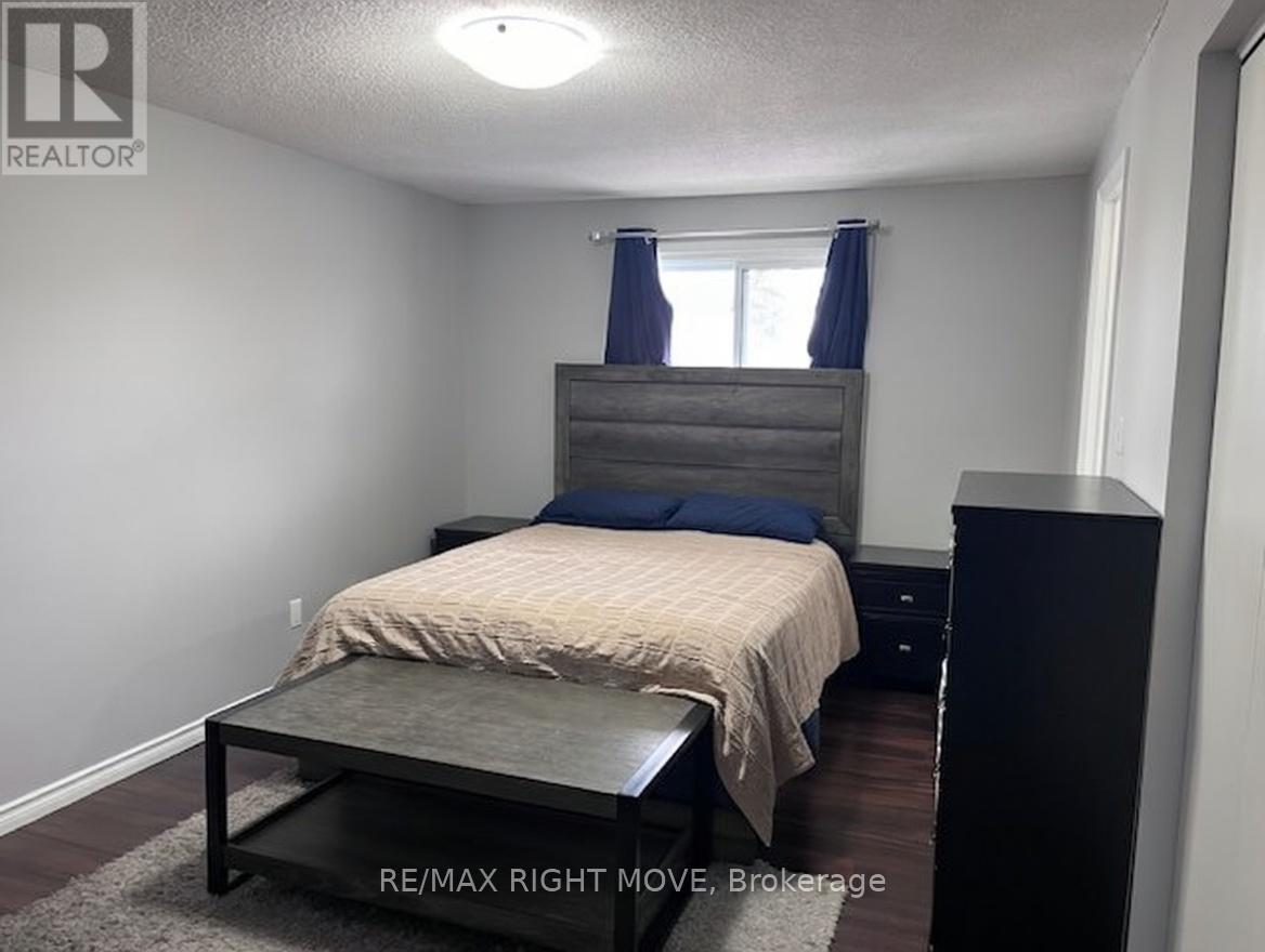 AI Enhanced - 3 - 486 Springbank Avenue N, Woodstock, ON - Indoor Photo Showing Bedroom