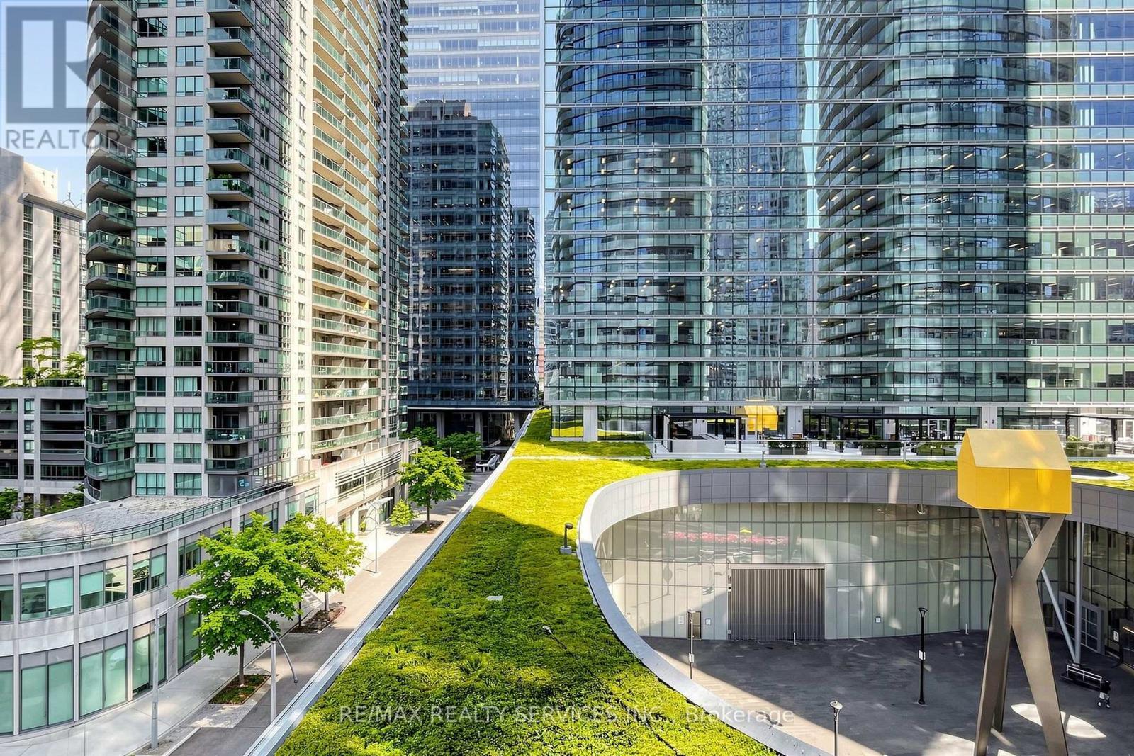 407 - 12 York Street, Toronto, ON - Outdoor With Balcony With Facade