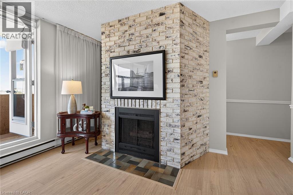 700 Dynes Road Unit# 904, Burlington, ON - Indoor Photo Showing Other Room With Fireplace