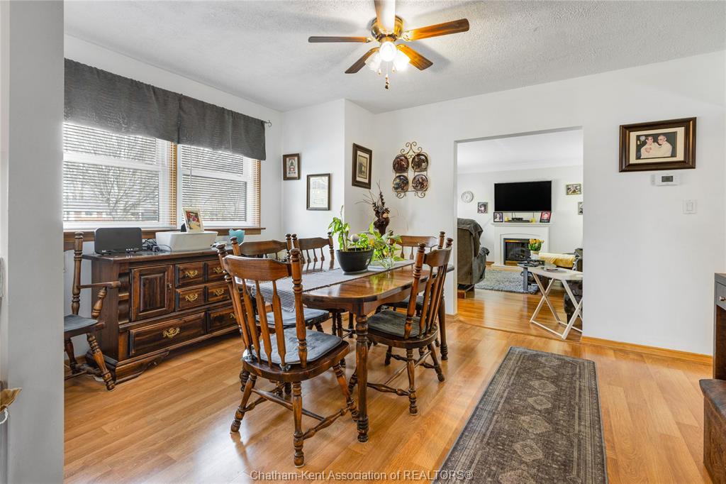 410 Mcnaughton Avenue East, Chatham, ON - Indoor Photo Showing Dining Room With Fireplace