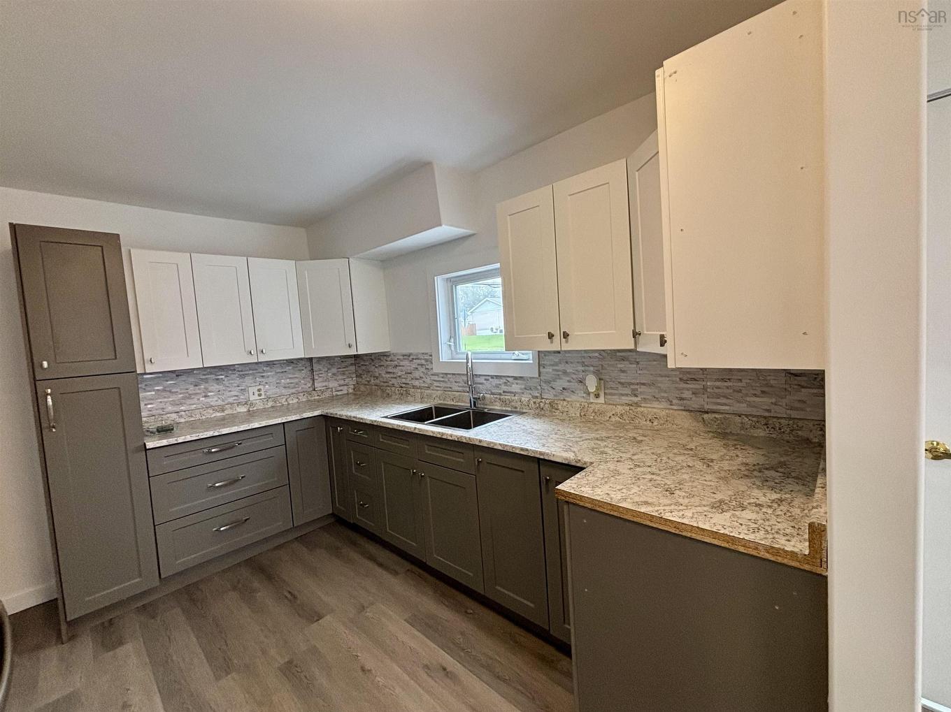683 Mahon Street, New Waterford, NS - Indoor Photo Showing Kitchen With Double Sink