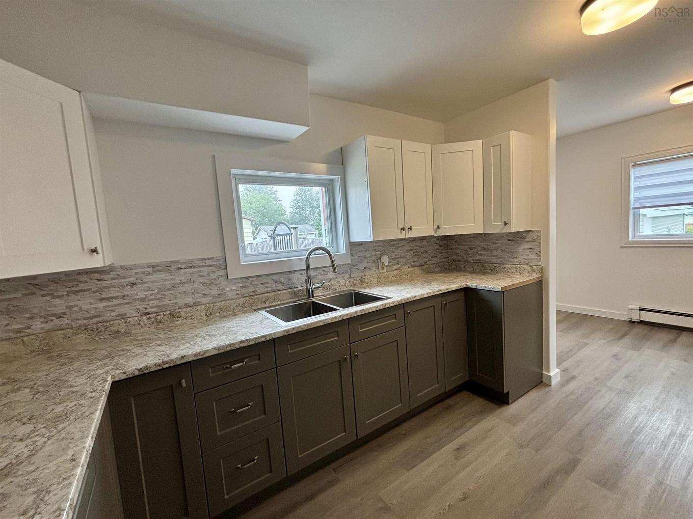 683 Mahon Street, New Waterford, NS - Indoor Photo Showing Kitchen With Double Sink