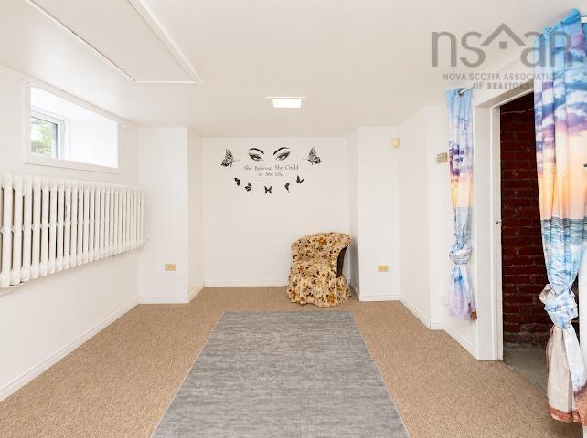 18/20 Queen Street, Sydney, NS - Indoor Photo Showing Other Room