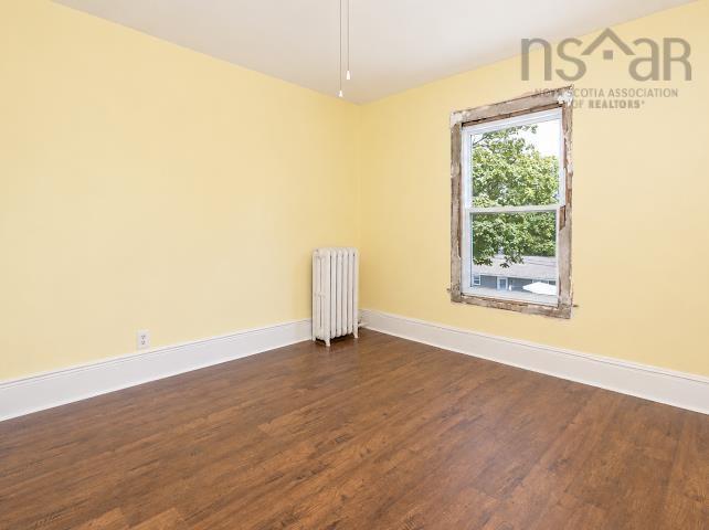 18/20 Queen Street, Sydney, NS - Indoor Photo Showing Other Room