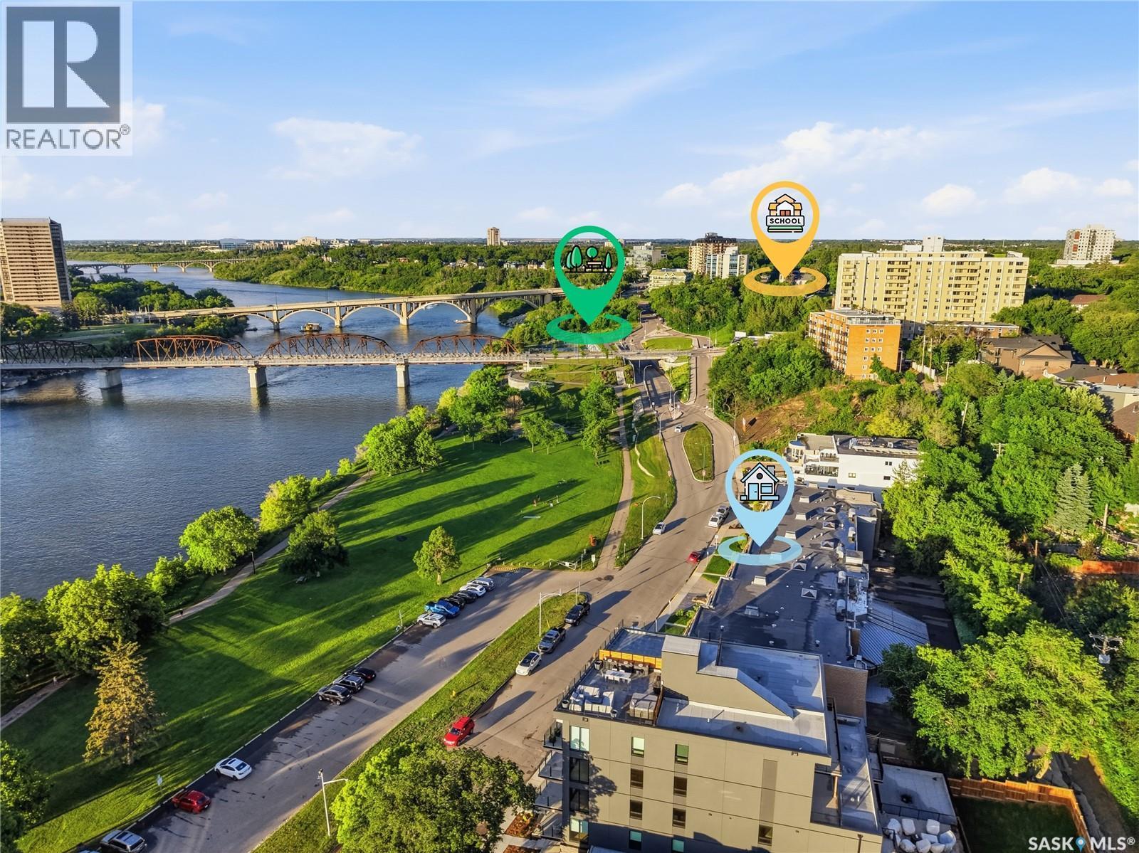 102 222 Saskatchewan Crescent E, Saskatoon, SK - Outdoor With Body Of Water With View