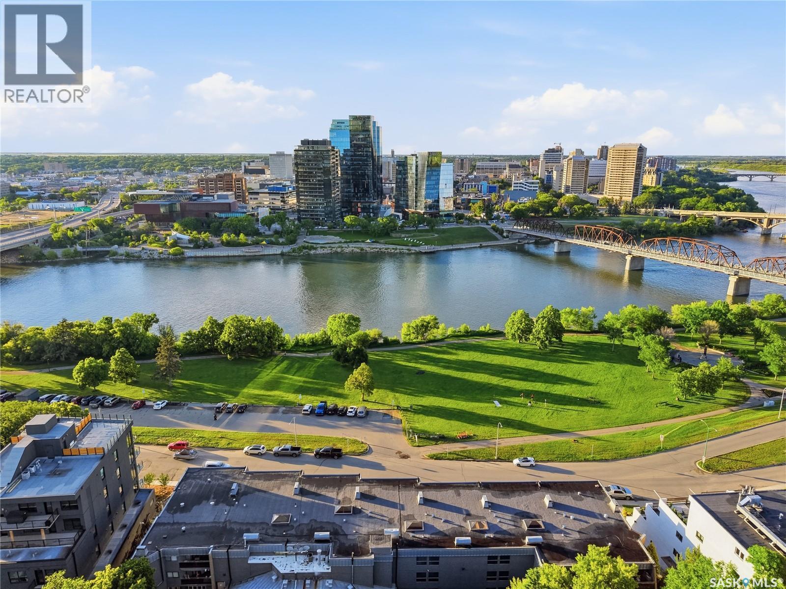 102 222 Saskatchewan Crescent E, Saskatoon, SK - Outdoor With Body Of Water With View