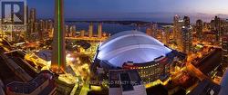 Nighttime view of CN Tower & Rogers Centre -