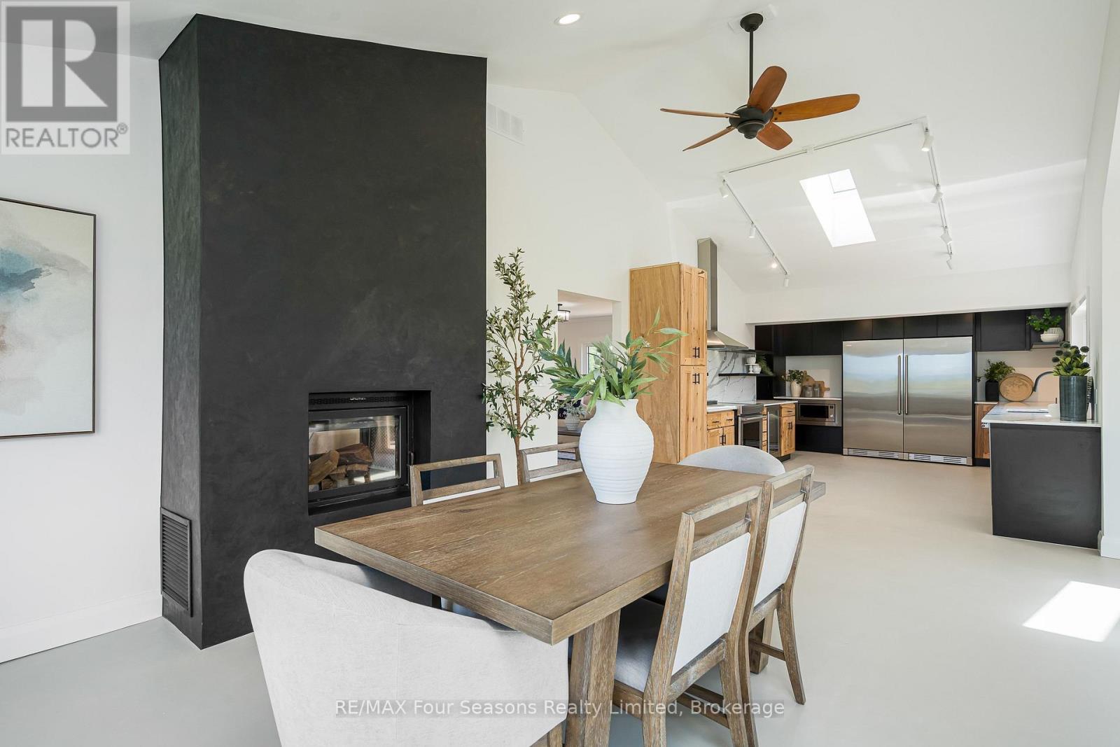 728454 21St Side Road, Blue Mountains, ON - Indoor Photo Showing Dining Room With Fireplace