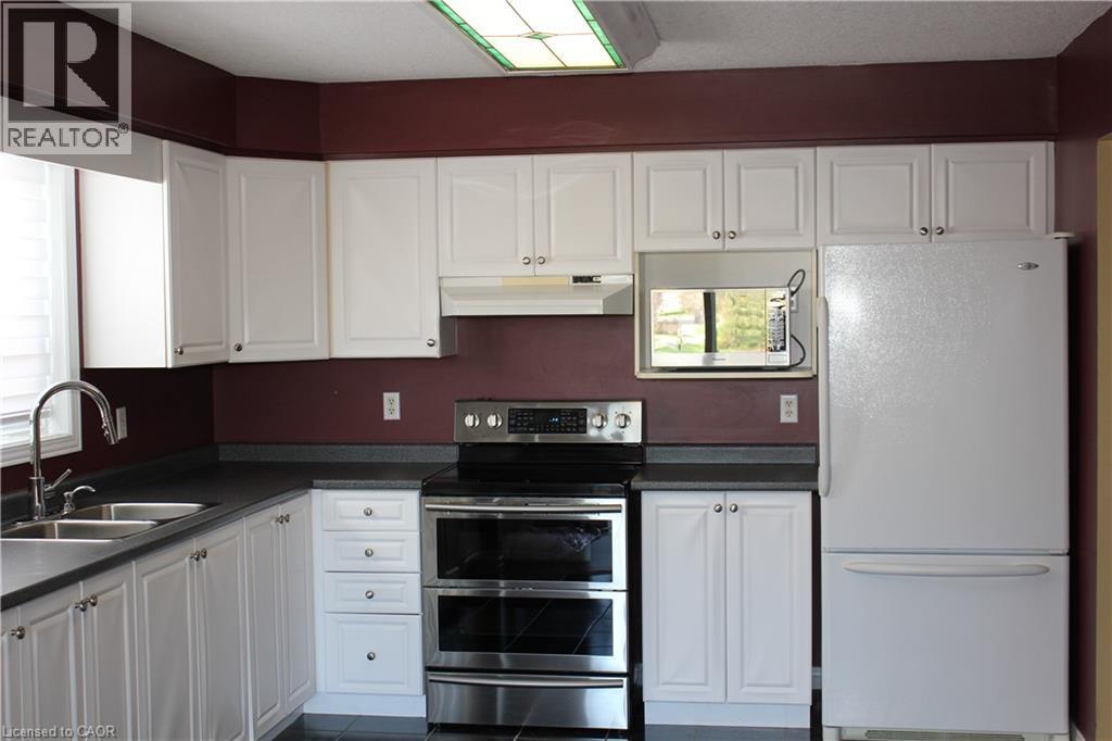 184 Northampton Crescent Unit# B, Waterloo, ON - Indoor Photo Showing Kitchen With Double Sink