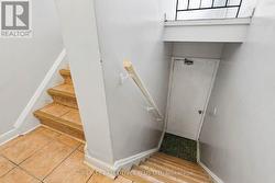 Stairs to the Laundry Room and Upper Apartment -