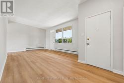 Upper Apartment Living Room W/O to Balcony -