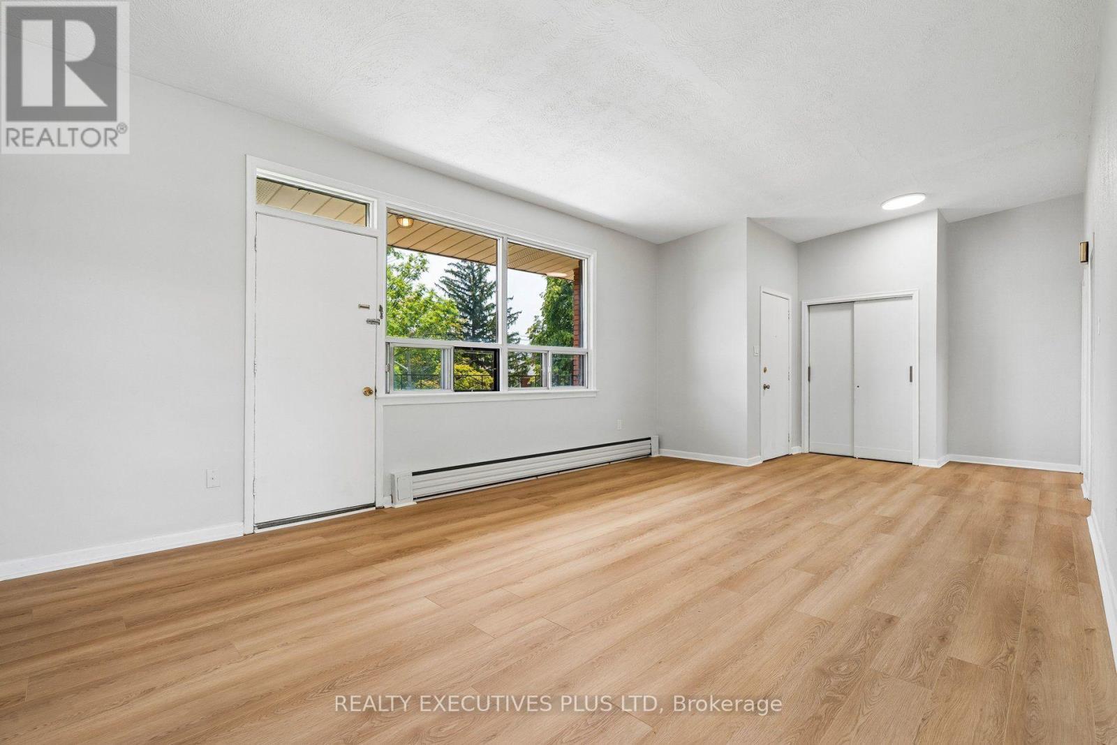 Upper Apartment Living Room W/O to Balcony - 74 Calstock Drive, Toronto, ON - Indoor
