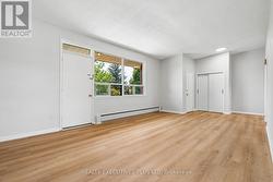 Upper Apartment Living Room W/O to Balcony -
