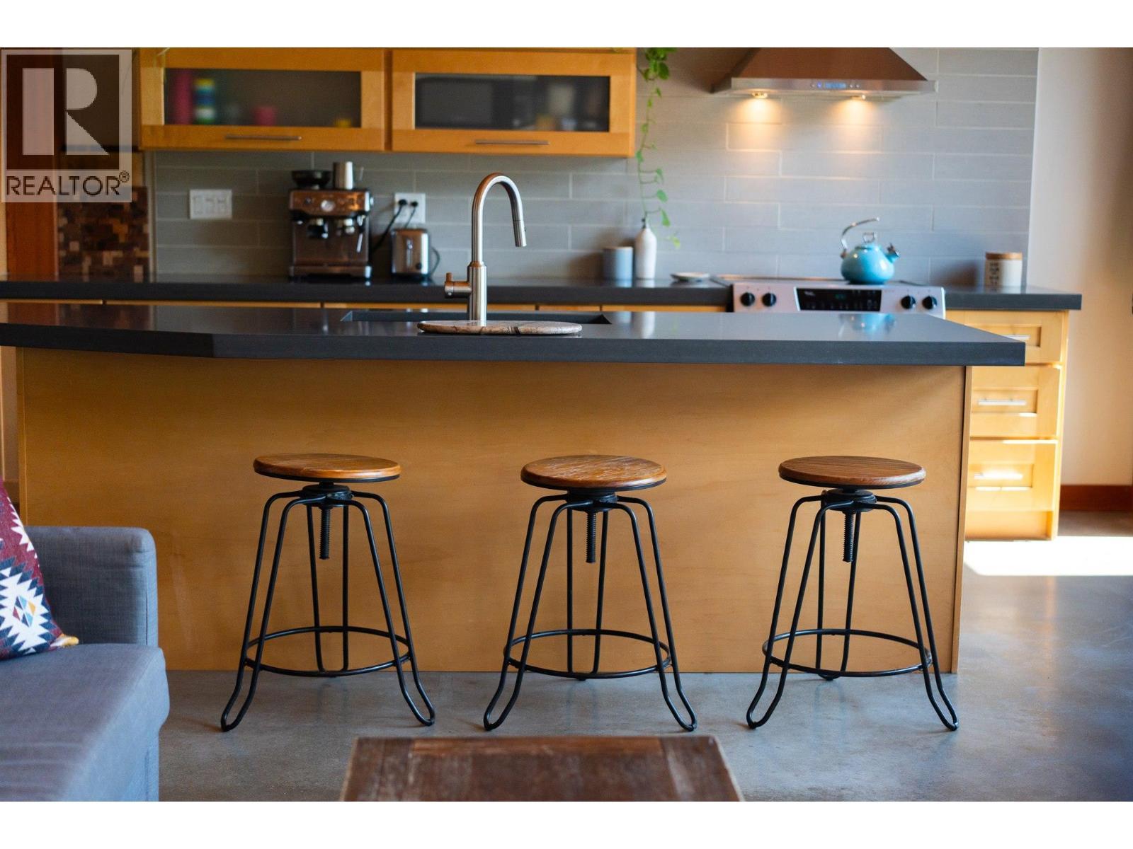 Kitchen in suite - 1917 Mt Mcpherson Drive, Revelstoke, BC - Indoor Photo Showing Kitchen With Double Sink