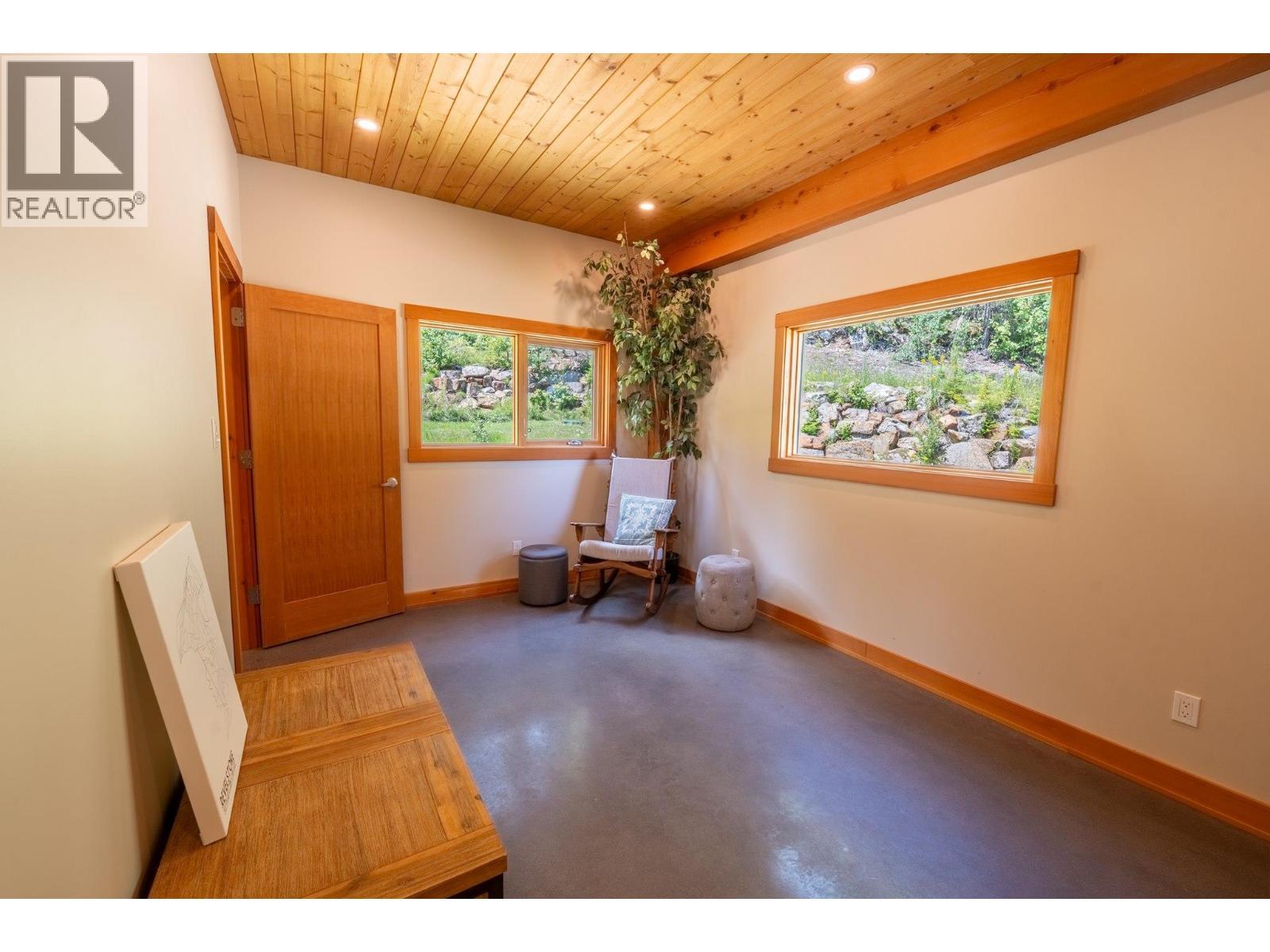 Gym/office in owners/caretaker suite - 1917 Mt Mcpherson Drive, Revelstoke, BC - Indoor Photo Showing Other Room