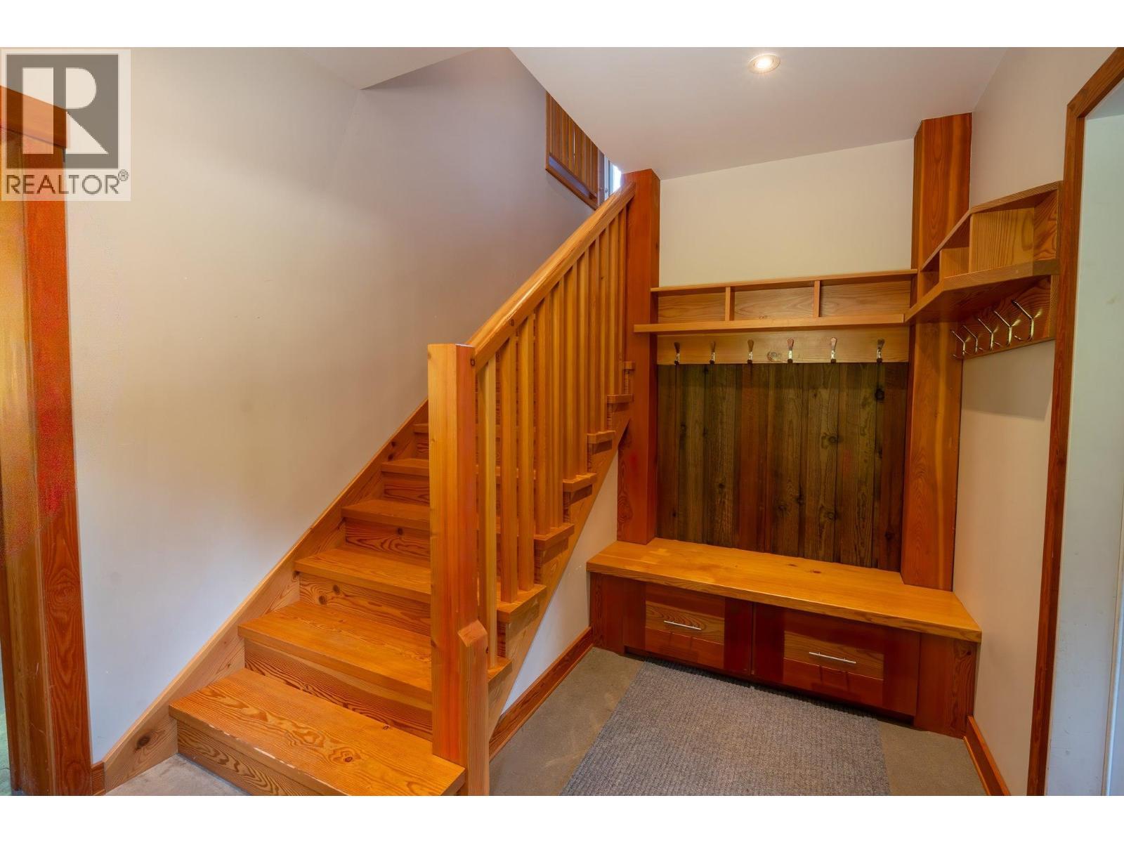 Entry to owners/caretaker suite - 1917 Mt Mcpherson Drive, Revelstoke, BC - Indoor Photo Showing Other Room