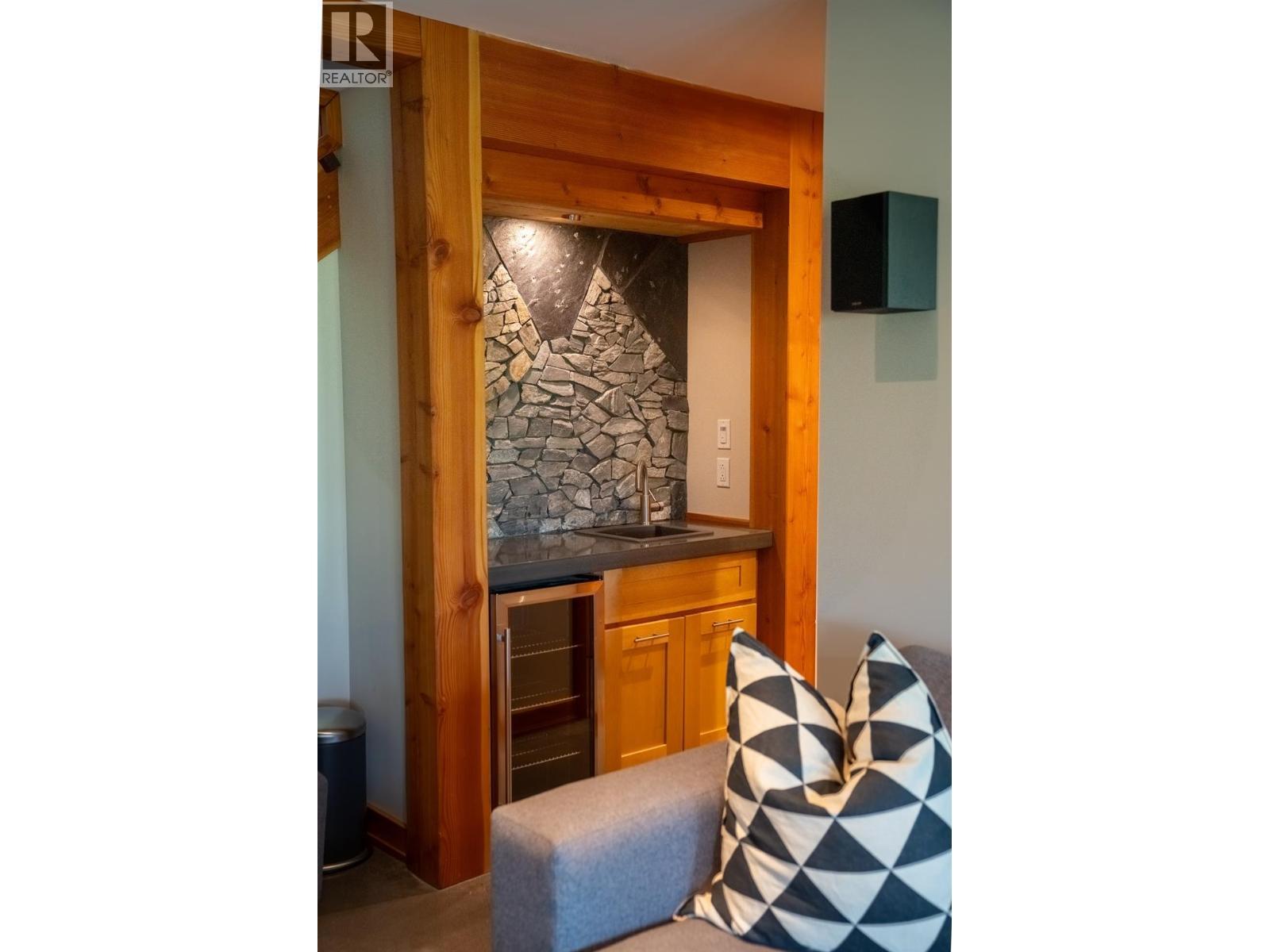 Lwer level wetbar - 1917 Mt Mcpherson Drive, Revelstoke, BC - Indoor Photo Showing Other Room