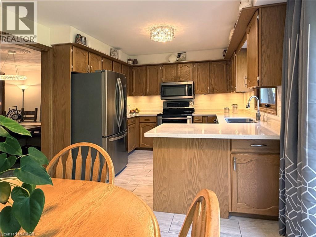 Eat in kitchen dining space. - 7 Mann Avenue, Simcoe, ON - Indoor Photo Showing Kitchen With Stainless Steel Kitchen
