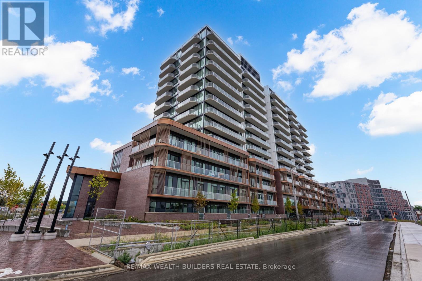 714 - 220 Missinnihe Way, Mississauga, ON - Outdoor With Balcony With Facade