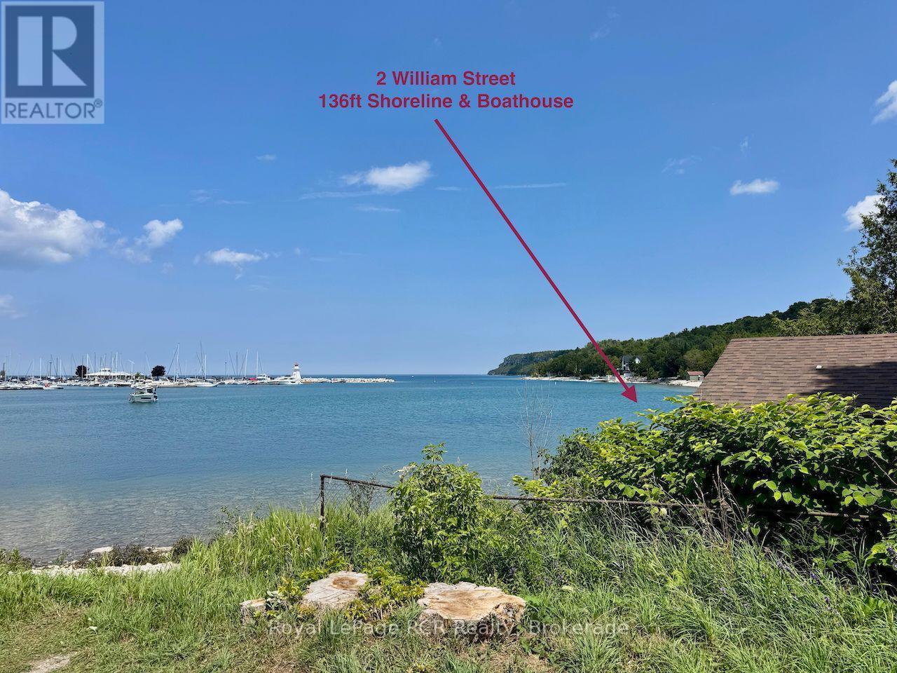 Yet within the quant Village of Lions Head. - 2 William Street, Northern Bruce Peninsula, ON - Outdoor With Body Of Water With View