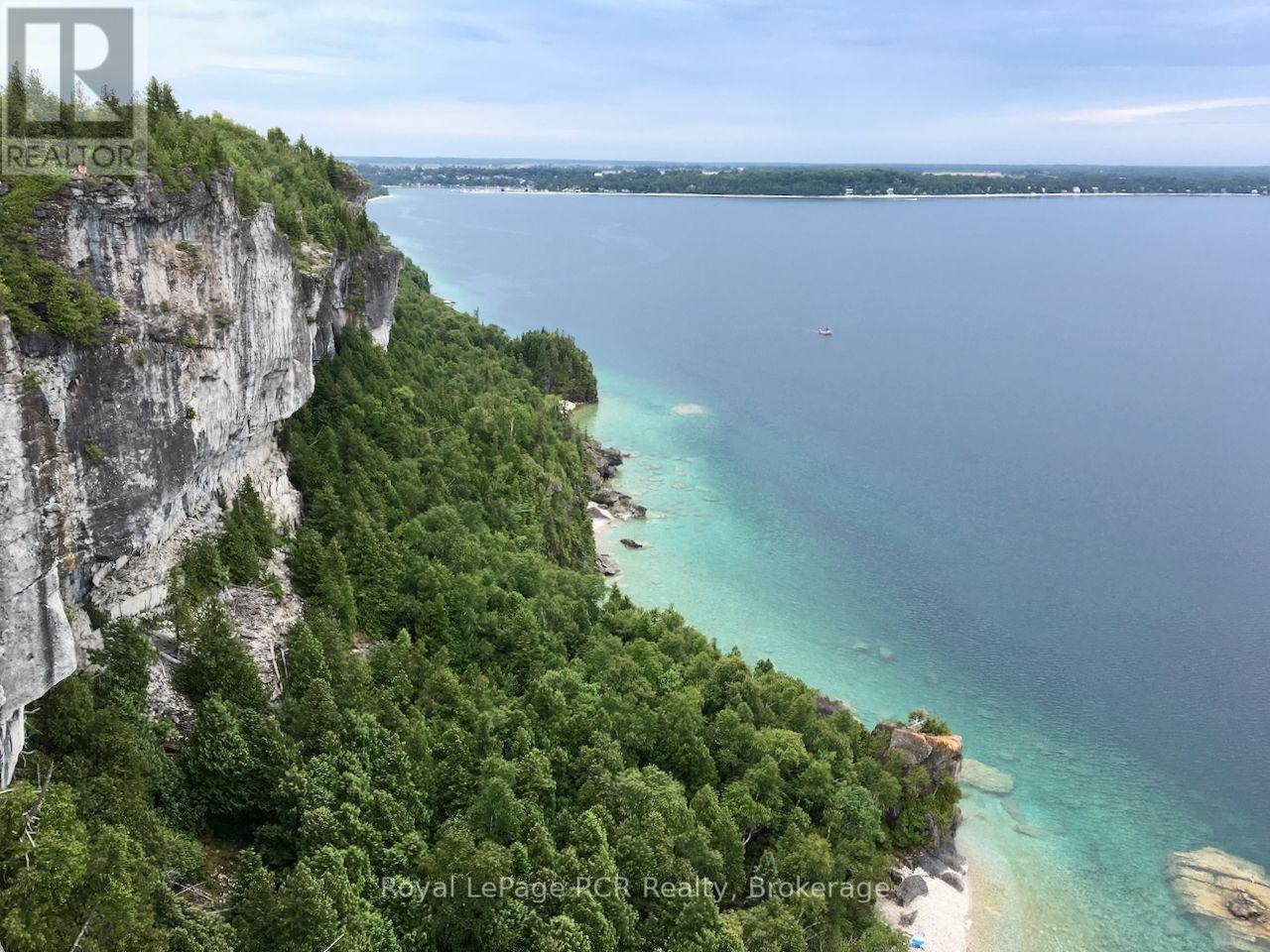 Walk to 300ft high Bruce Trail escarpment bluffs. - 2 William Street, Northern Bruce Peninsula, ON - Outdoor With Body Of Water With View