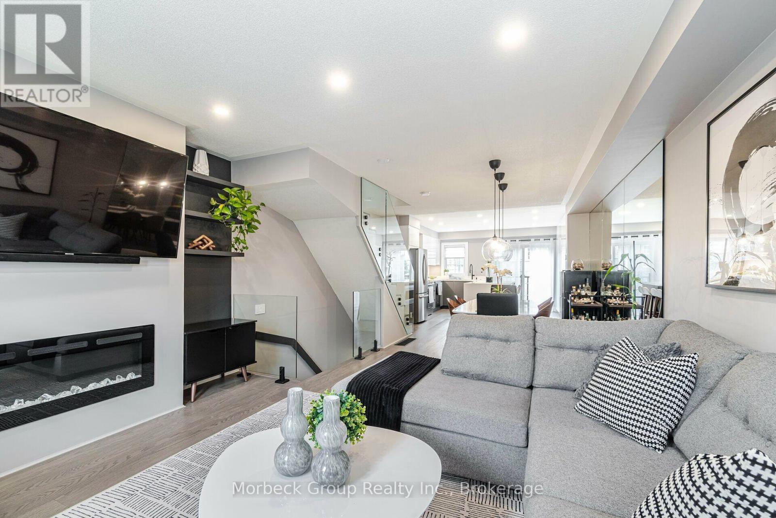 24 - 1100 Begley Street, Pickering (Bay Ridges), ON - Indoor Photo Showing Living Room With Fireplace
