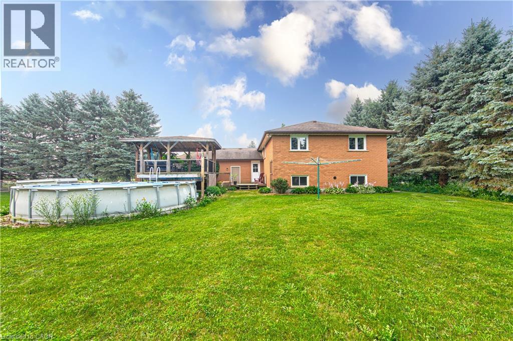 40 Peter Street, Scotland, ON - Outdoor With Above Ground Pool With Backyard