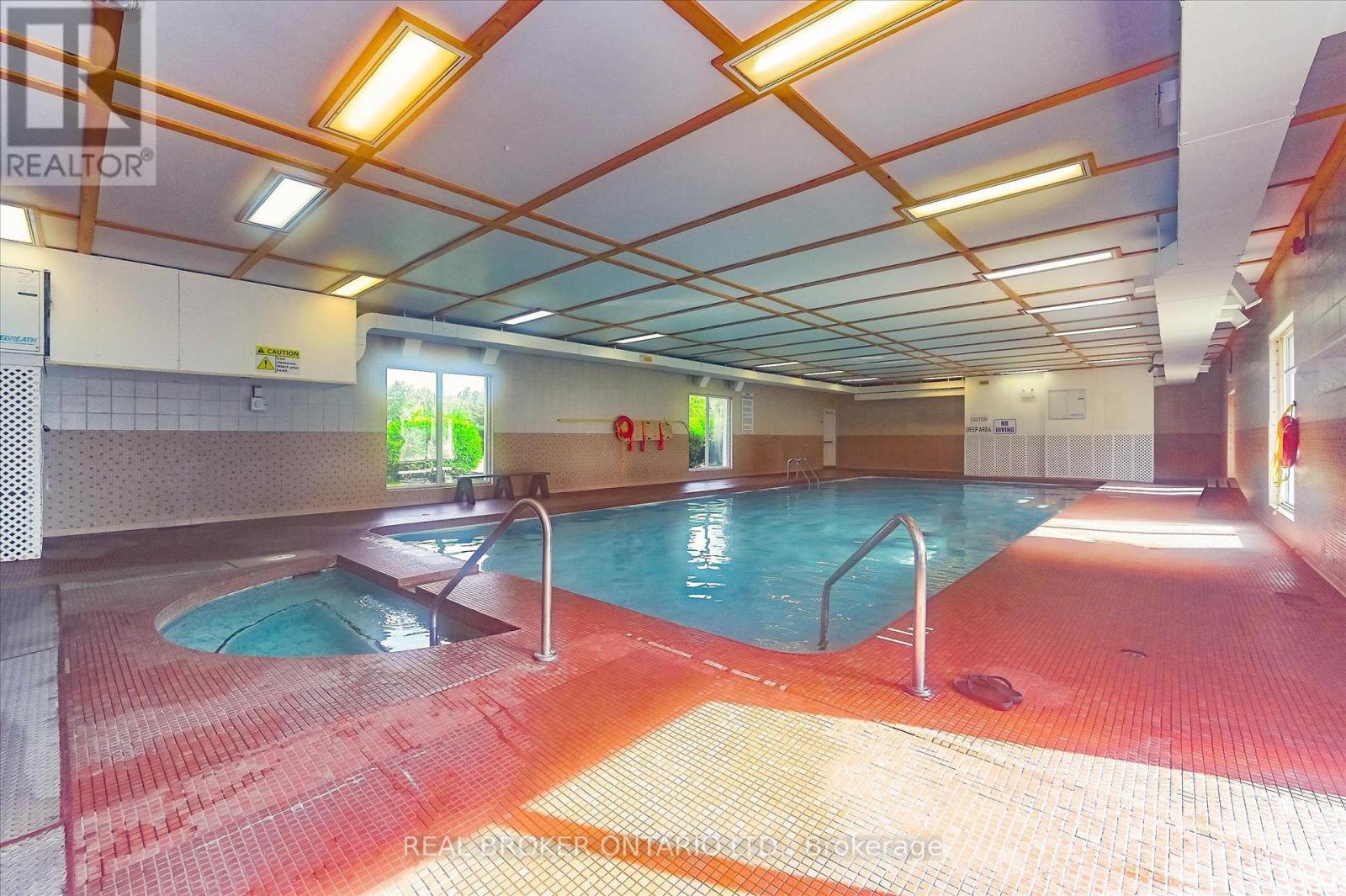 445 Pine Pass, Centre Wellington, ON - Indoor Photo Showing Other Room With In Ground Pool