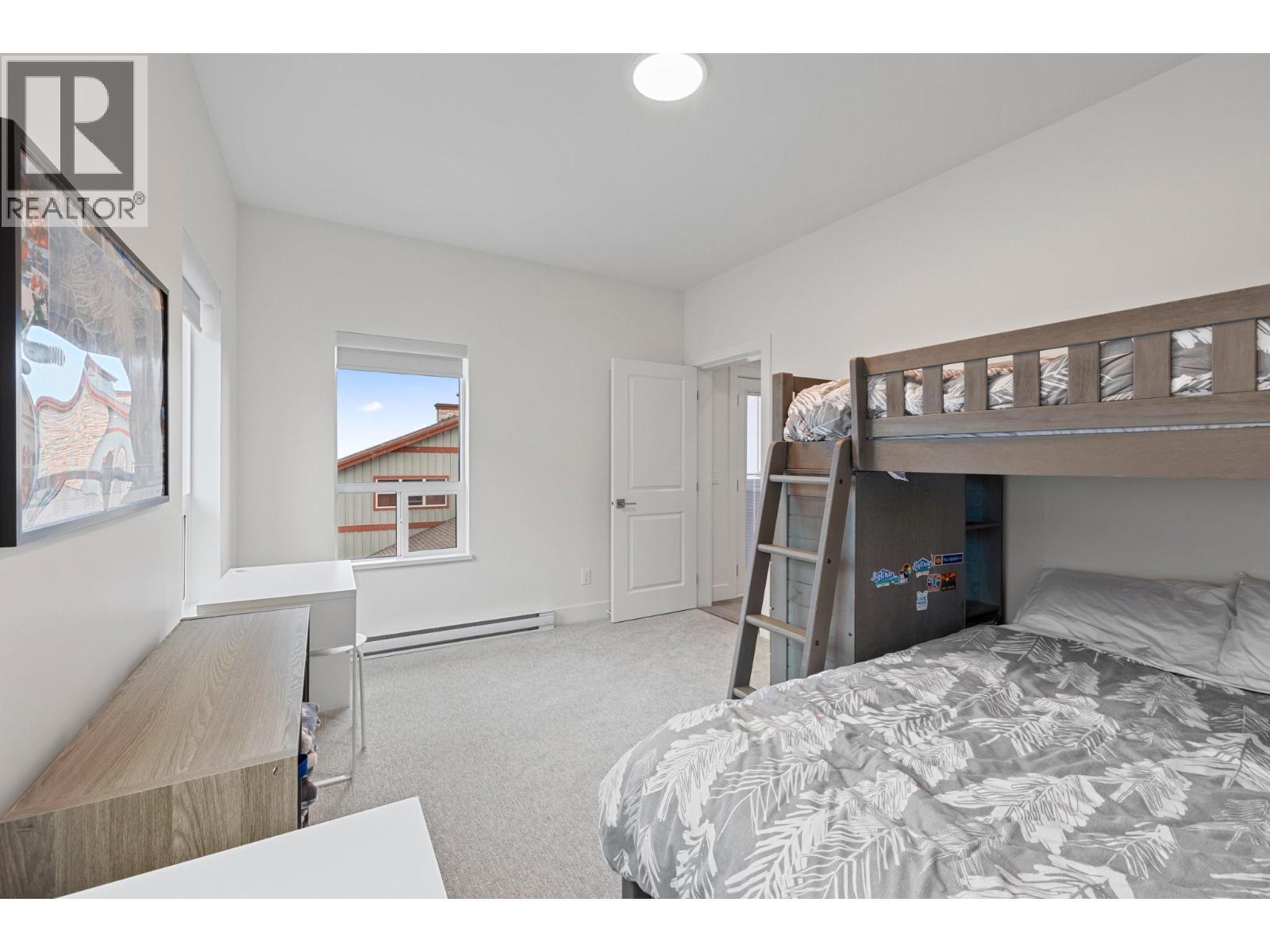 Bed 3 - 5075 Snowbird Way Unit# 8E, Big White, BC - Indoor Photo Showing Bedroom