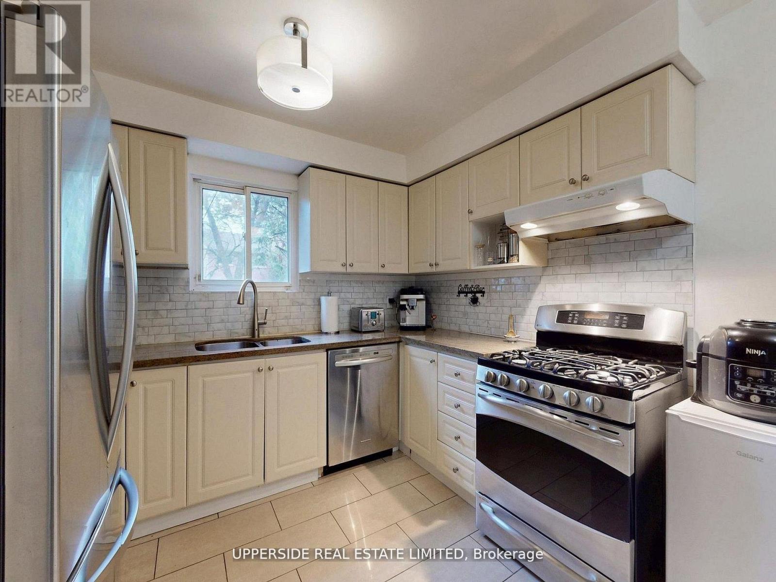 64 Colleen Street, Vaughan, ON - Indoor Photo Showing Kitchen With Double Sink