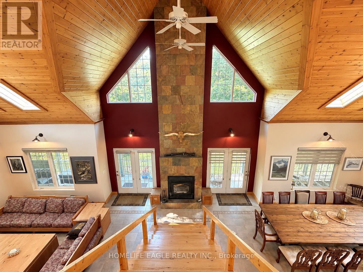 3 Northshore Drive, Parry Sound Remote Area, ON - Indoor Photo Showing Living Room With Fireplace