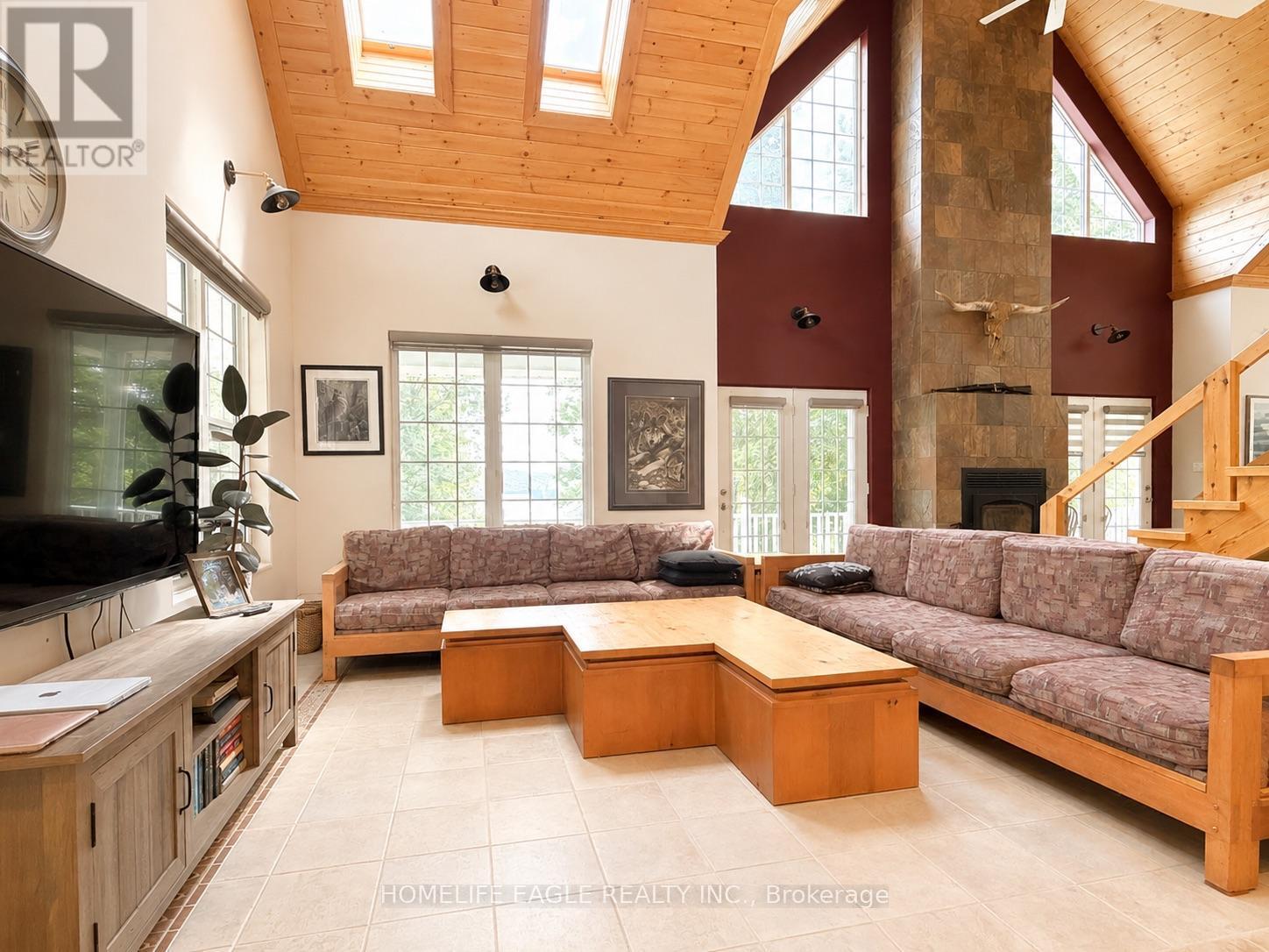 3 Northshore Drive, Parry Sound Remote Area, ON - Indoor Photo Showing Living Room With Fireplace