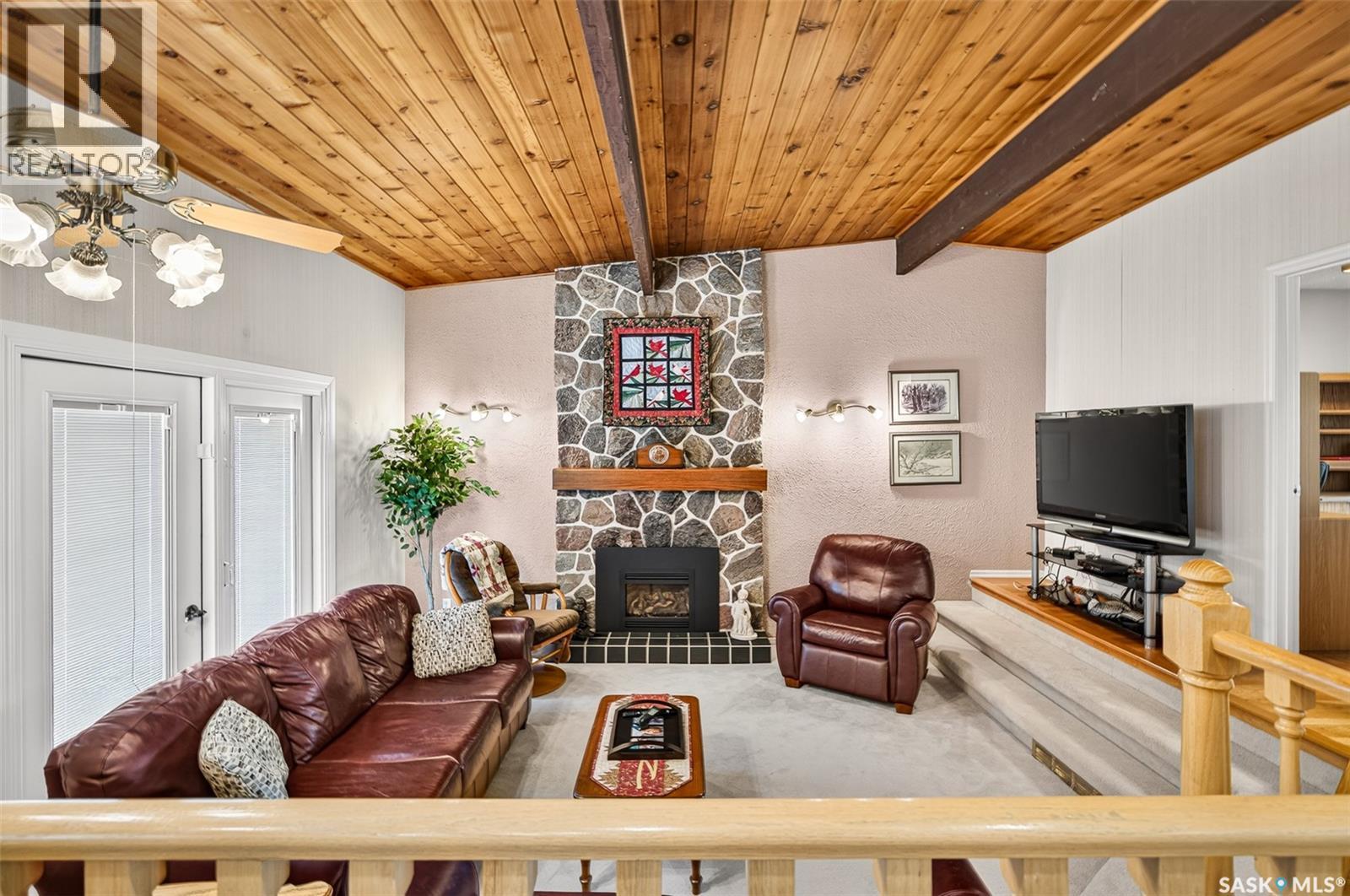 1188 2Nd Avenue Ne, Moose Jaw, SK - Indoor Photo Showing Living Room With Fireplace