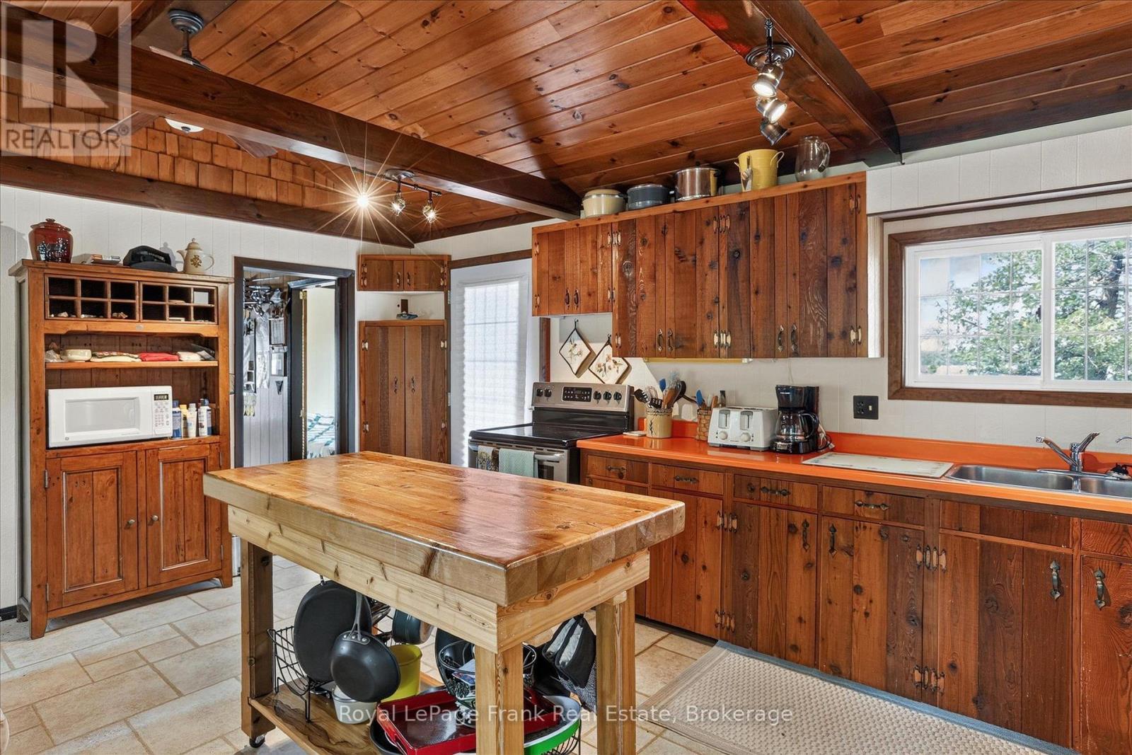 1550 Island 85 Stoney Lake, Douro-Dummer, ON - Indoor Photo Showing Kitchen With Double Sink