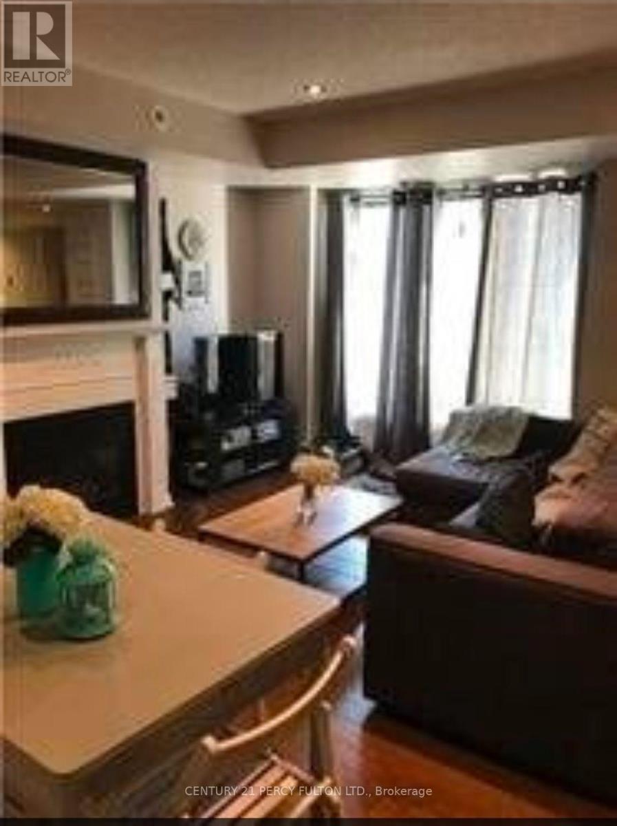 3 Everson Drive, Toronto, ON - Indoor Photo Showing Living Room With Fireplace