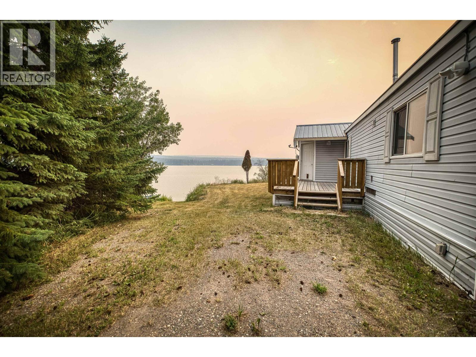 4078 Mckinley Drive, Lac La Hache, BC - Outdoor With Body Of Water