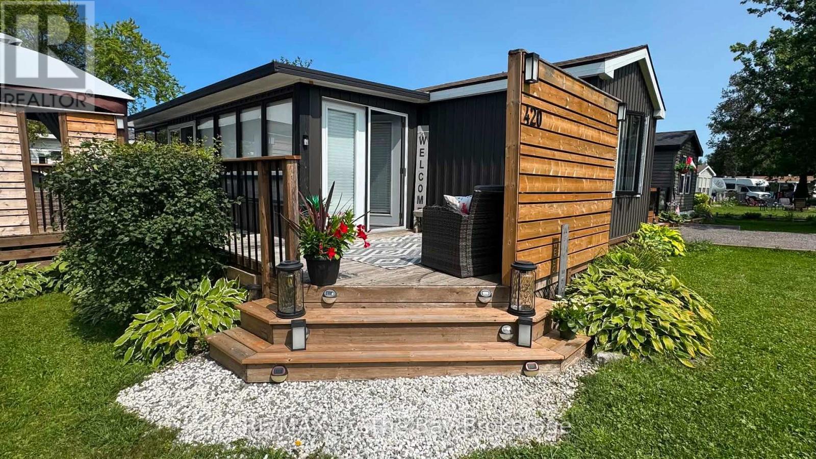 420 - 225 Platten Boulevard, Scugog, ON - Outdoor With Deck Patio Veranda With Exterior