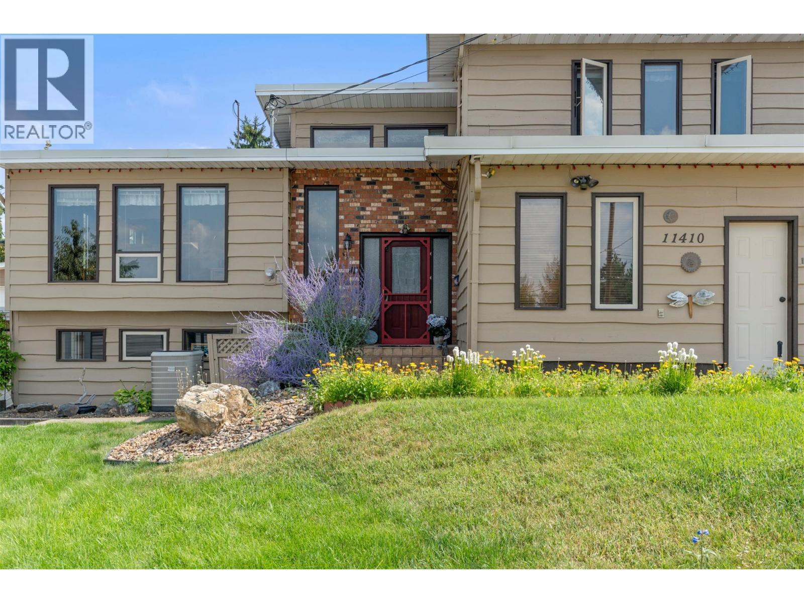 11410 Tassie Drive, Coldstream, BC - Outdoor With Facade