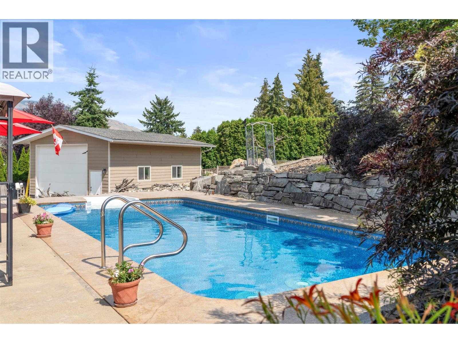 11410 Tassie Drive, Coldstream, BC - Outdoor With In Ground Pool