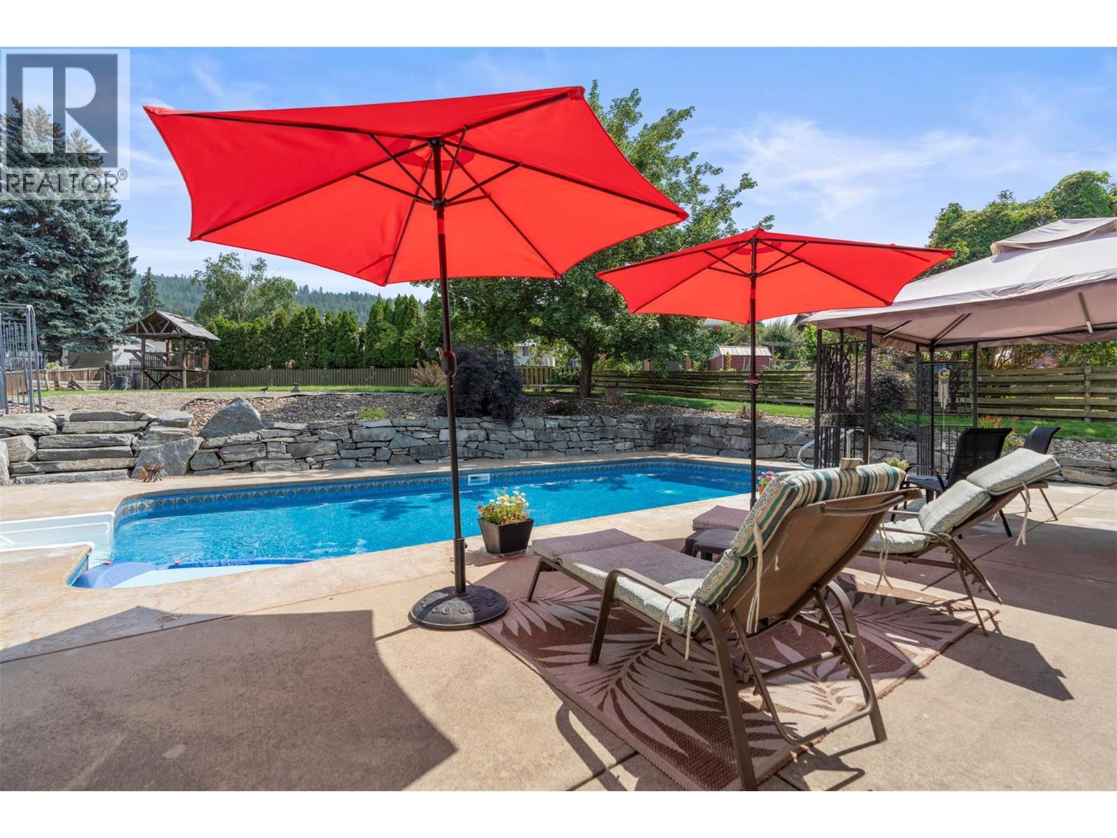 11410 Tassie Drive, Coldstream, BC - Outdoor With In Ground Pool With Deck Patio Veranda