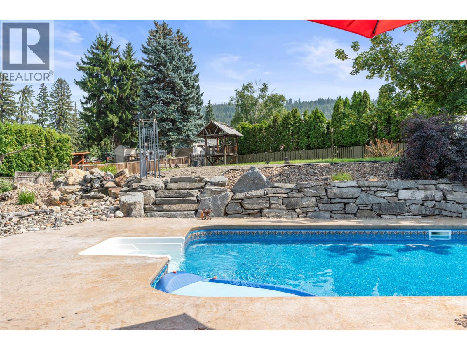11410 Tassie Drive, Coldstream, BC - Outdoor With In Ground Pool