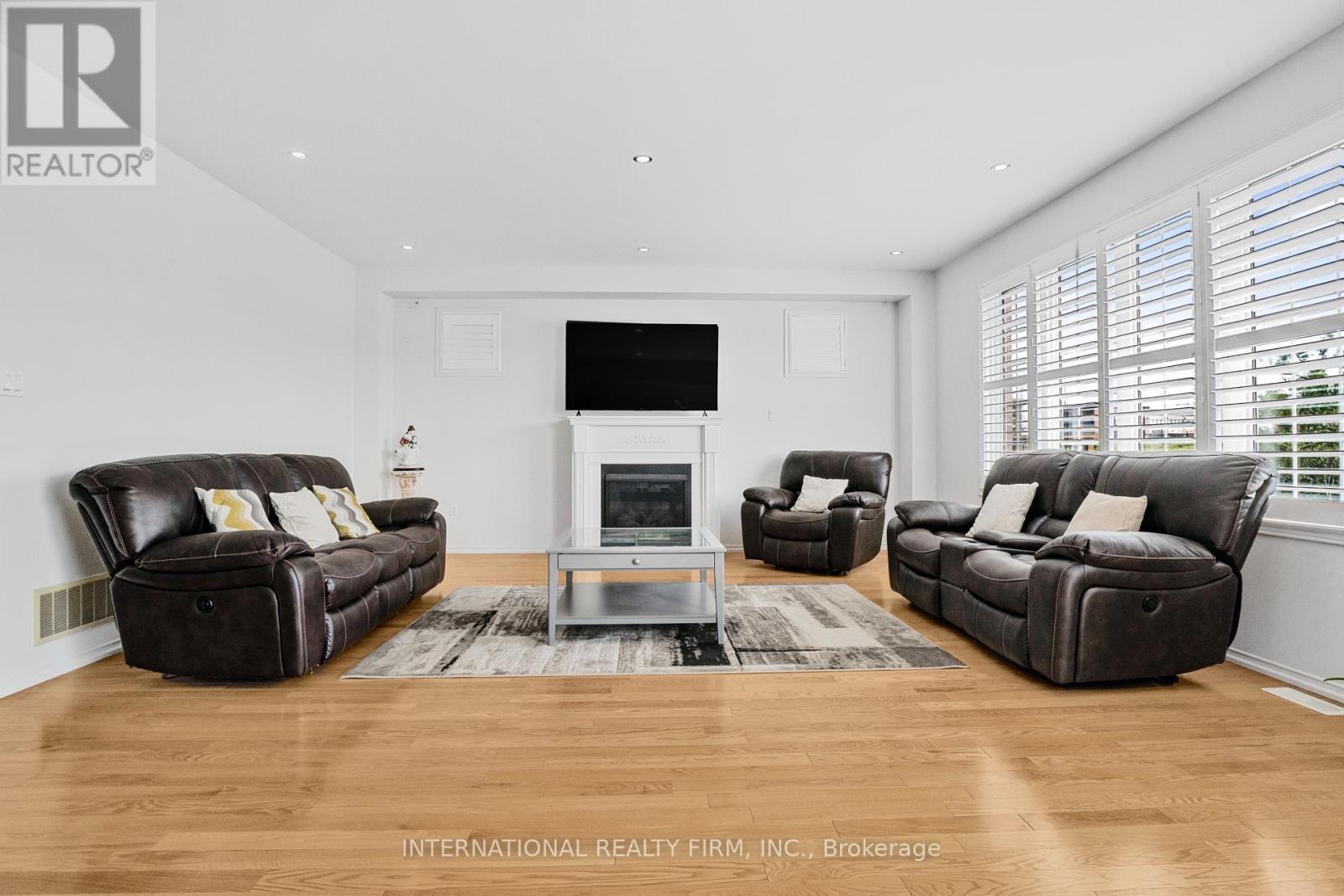 2537 Snow Knight Drive, Oshawa, ON - Indoor Photo Showing Living Room With Fireplace
