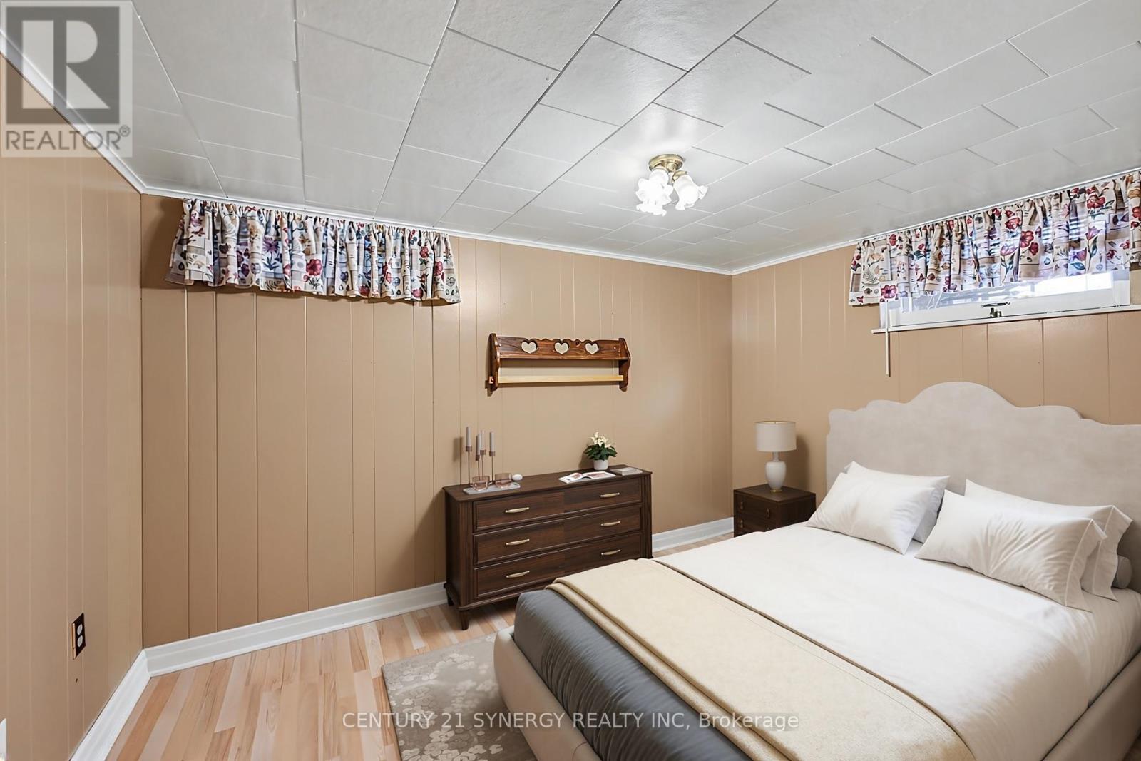 Third bedroom on lower level (virtually staged). - 5 Queen Street, Smiths Falls, ON - Indoor Photo Showing Bedroom