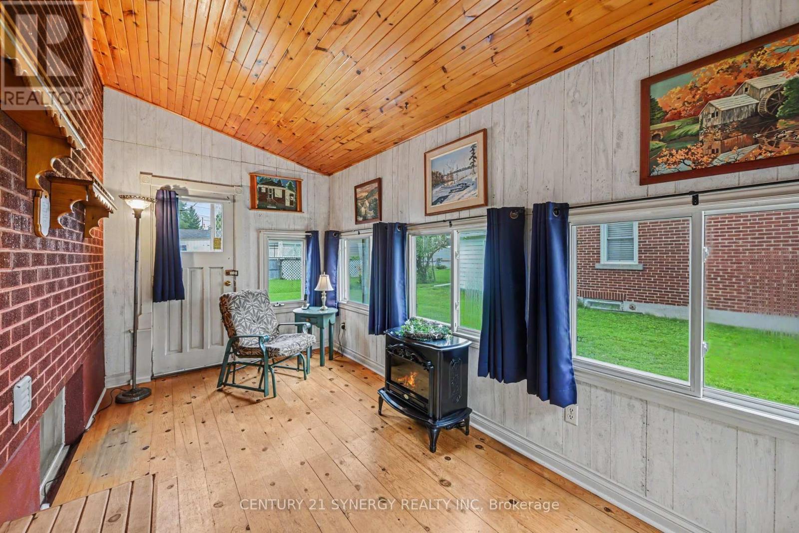 Four season sunroom with access to backyard. - 5 Queen Street, Smiths Falls, ON - Indoor Photo Showing Other Room