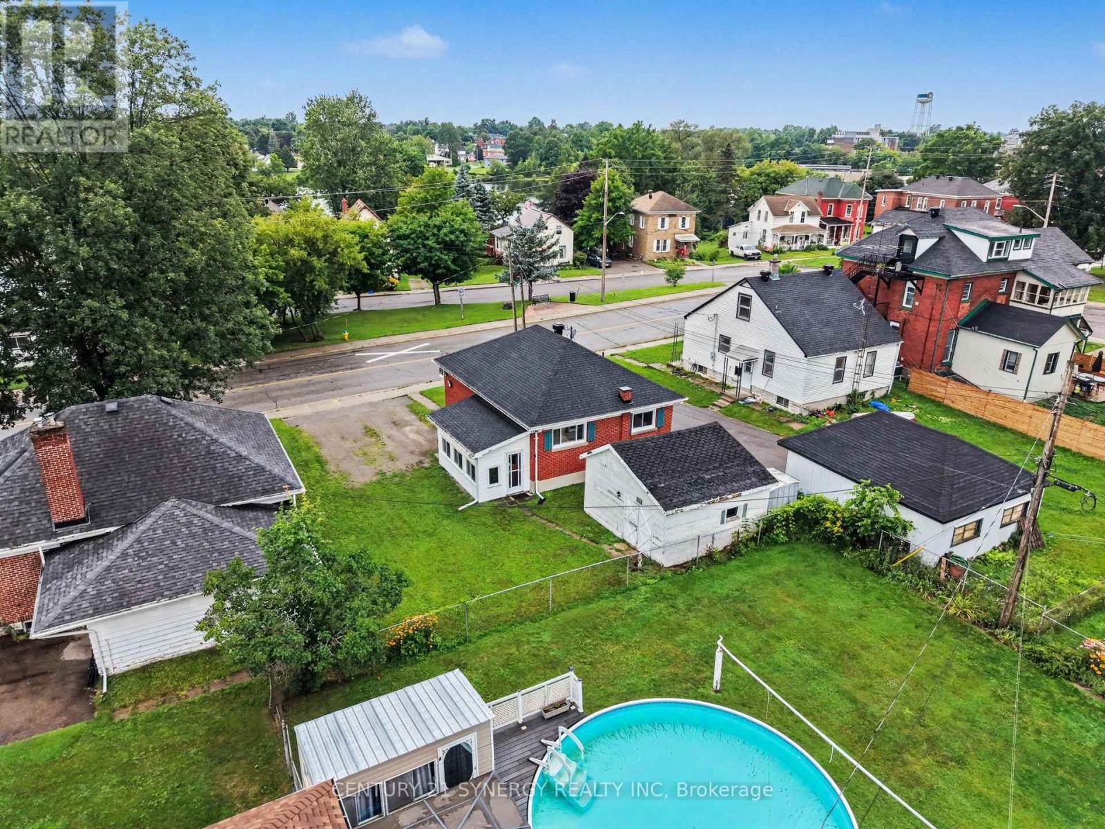 Backyard & Detached Workshop with Storage Loft - 5 Queen Street, Smiths Falls, ON - Outdoor With Above Ground Pool