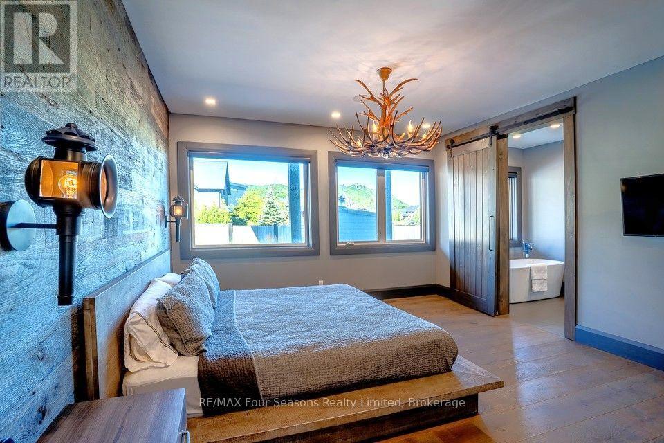 MAIN LEVEL PRIMARY BEDROOM - 116 Arnot Crescent, Blue Mountains, ON - Indoor Photo Showing Bedroom